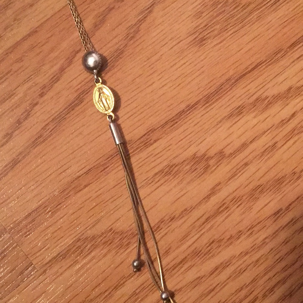 Two tone silver and gold religious necklace